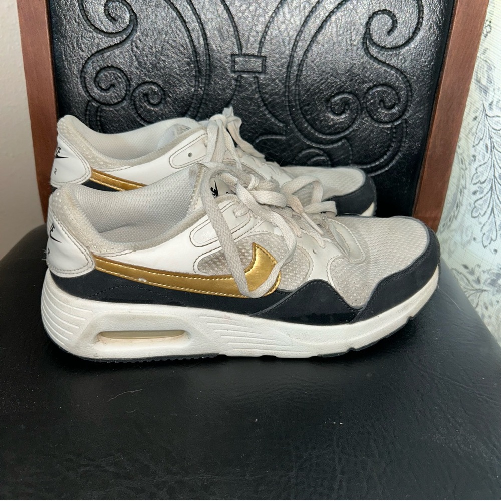 Nike Women's White, Black, and Gold Sneakers